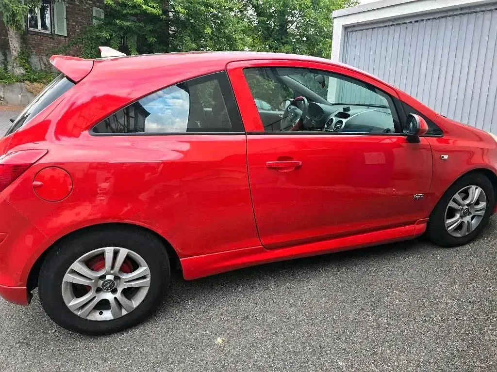 Gebraucht Opel Corsa 90 PS (66 kW) 2009 Rot Kleinwagen