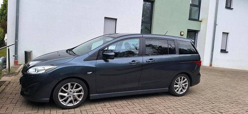 Grau Gebraucht 2010 Mazda 5 Inclusive Van / Kleinbus | 7.500 € - Bild 1/4