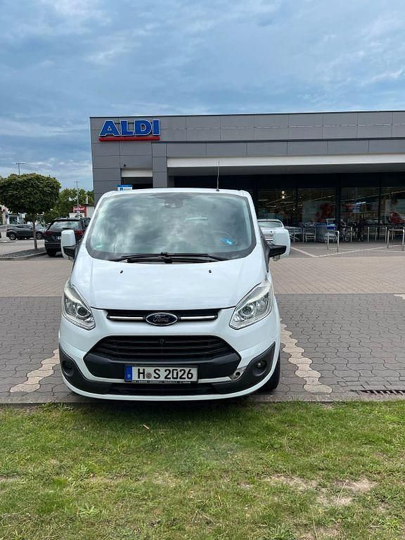Weiß Gebraucht 2012 Ford Tourneo Custom Van / Kleinbus | 11.350 € - Bild 1/4