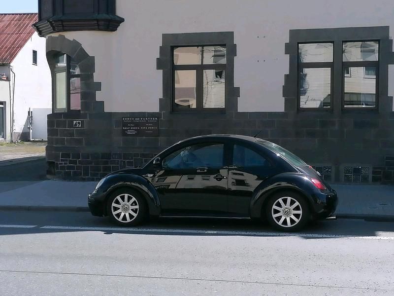 Gebraucht VW New Beetle 90 PS (66 kW) 1999 Schwarz Kleinwagen