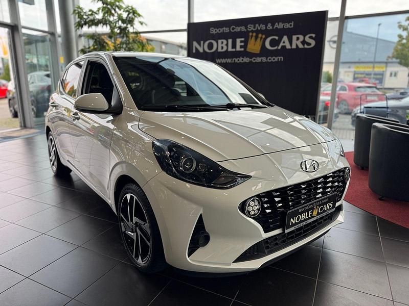 Weiß Gebraucht 2021 Hyundai i10 Edition 30+ Kleinwagen | 11.990 € (Fairer Preis) - Bild 1/4
