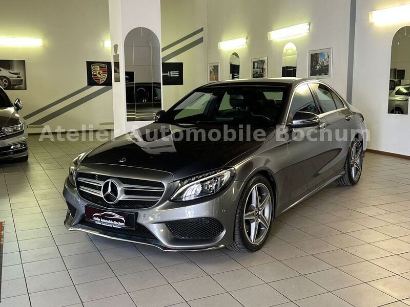 Grau Gebraucht 2018 Mercedes C180 AMG line Limousine | 21.900 € (Guter Preis) - Bild 1/4