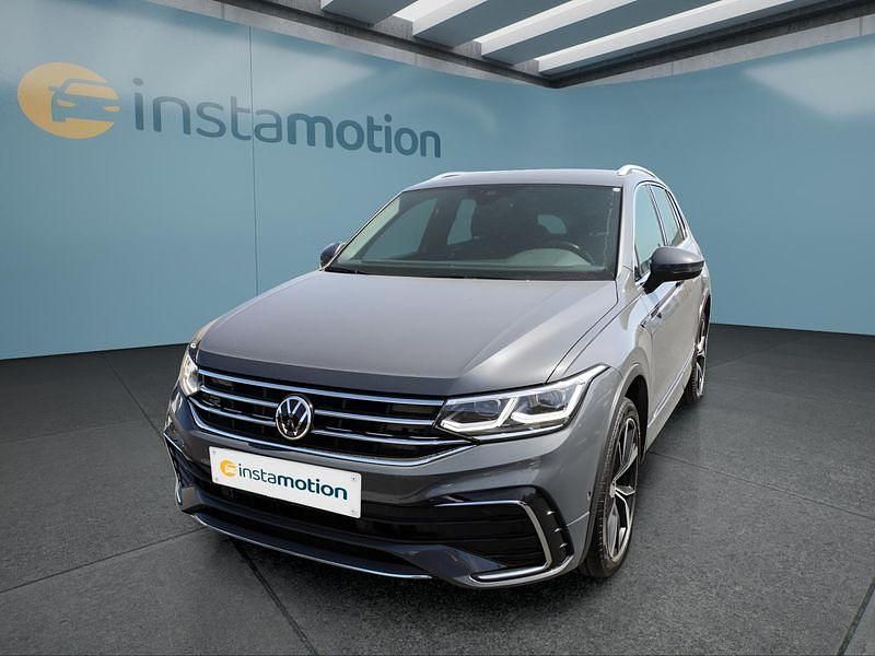 Grau Gebraucht 2021 VW Tiguan SUV | 35.599 € (Teuer) - Bild 1/4