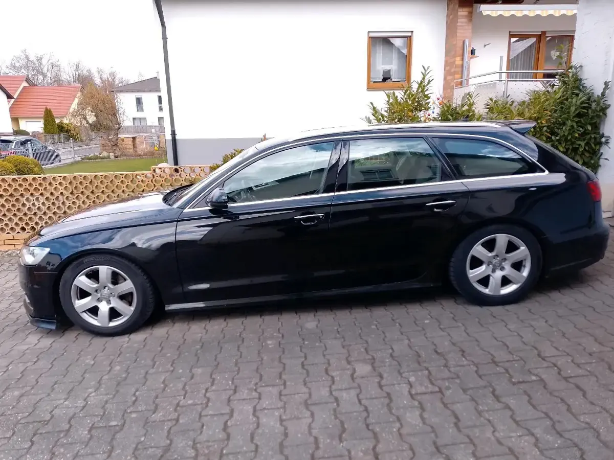 Używany Audi A6 218 KM (160 kW) 2015 Czarny Kombi