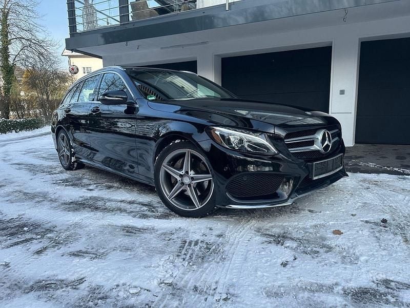 Schwarz Gebraucht 2015 Mercedes C180 AMG line Kombi | 16.499 € (Fairer Preis) - Bild 1/4