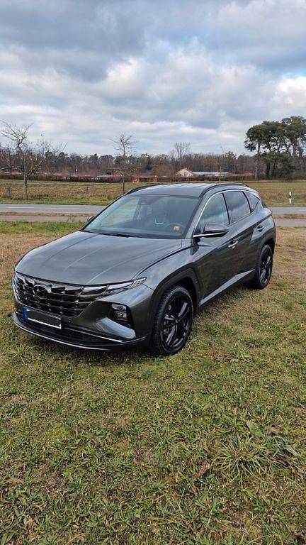 Grau Gebraucht 2021 Hyundai Tucson Prime SUV | 26.900 € (Fairer Preis) - Bild 1/4
