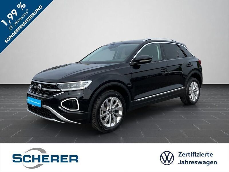 Deep black perleffekt (metallic) Gebraucht 2024 VW T-Roc Style SUV | 30.975 € (Fairer Preis) - Bild 1/4