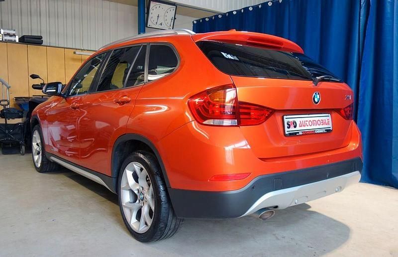 Gebraucht BMW X1 Performance 184 PS (135 kW) 2014 Valencia orange metallic SUV