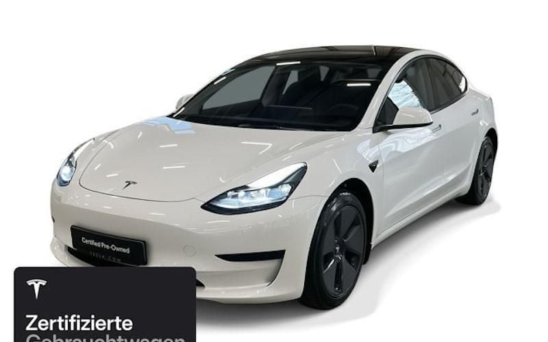Weiß Gebraucht 2021 Tesla Model 3 Standard Range Limousine | 26.900 € (Fairer Preis) - Bild 1/4