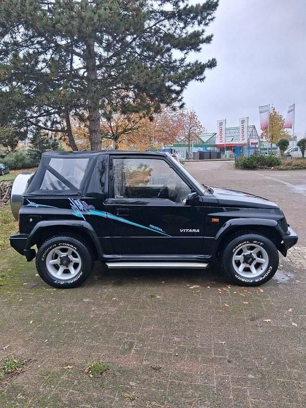 Gebraucht Suzuki Vitara 86 PS (63 kW) 1994 Schwarz Cabrio