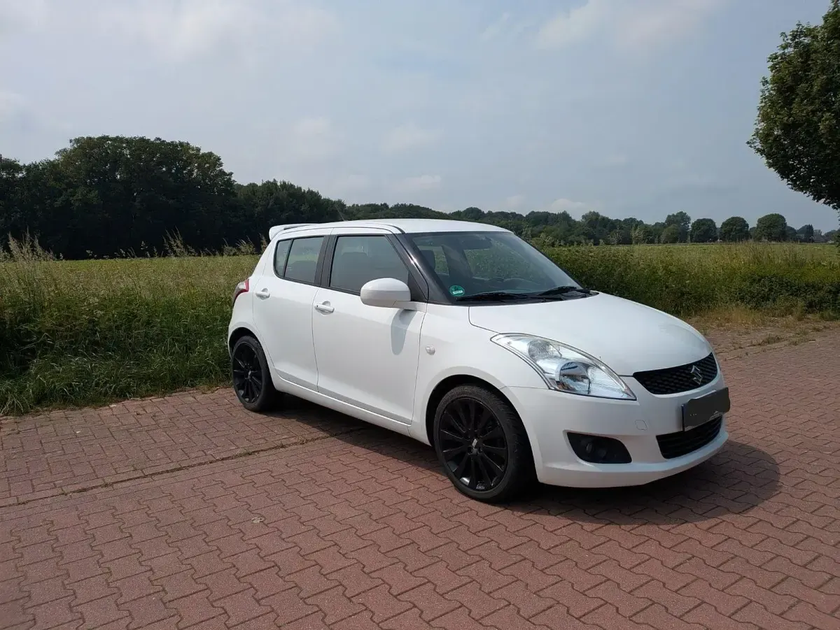 Gebraucht Suzuki Swift 94 PS (69 kW) 2012 Weiß Kleinwagen