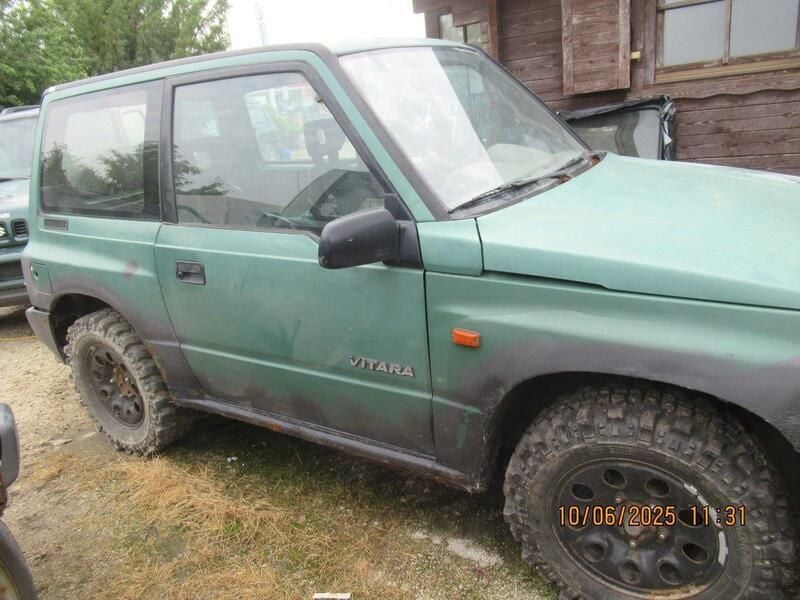 Grün Gebraucht 1998 Suzuki Vitara SUV | 850 € - Bild 1/4