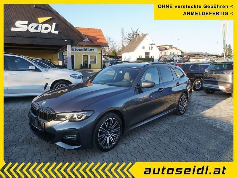 Grau Gebraucht 2022 BMW 320e M Sport Kombi | 21.990 € (Superpreis) - Bild 1/4