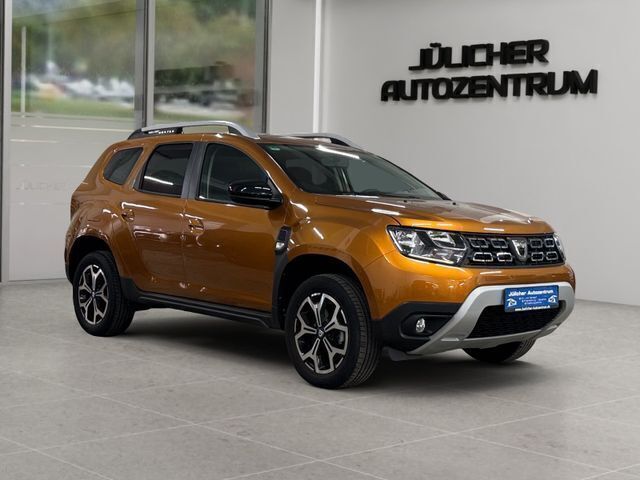 Orange Gebraucht 2021 Dacia Duster Celebration SUV | 16.990 € (Superpreis) - Bild 1/4