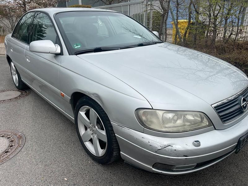 Second-hand Opel Omega 170 CP (125 kW) 2000 Argintiu Berlinǎ