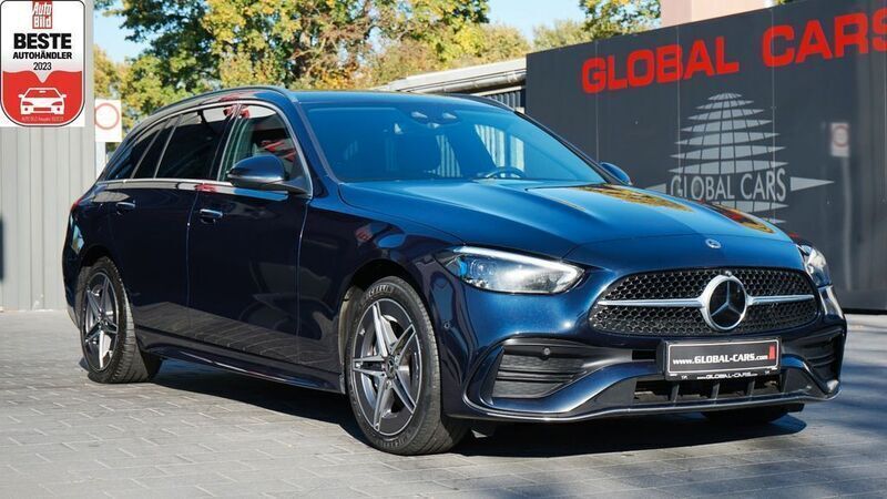 Cavansitblau metalliclack Gebraucht 2022 Mercedes C300e AMG Kombi | 29.885 € - Bild 1/4