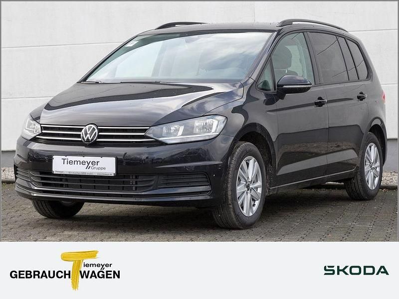 Schwarz Gebraucht 2024 VW Touran Comfortline Van / Kleinbus | 33.230 € (Fairer Preis) - Bild 1/4