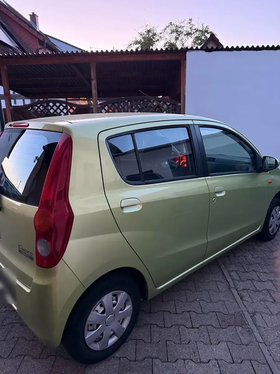 Brugt Daihatsu Cuore 70 HK (51 kW) 2010 Grøn Hatchback