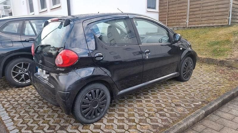 Gebraucht Toyota Aygo 68 PS (50 kW) 2006 Schwarz Kleinwagen