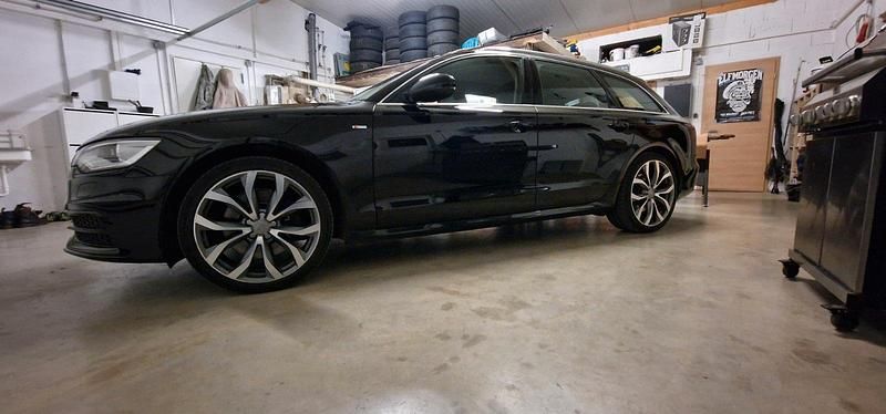 Używany Audi A6 Ambiente 245 KM (180 kW) 2014 Czarny Kombi