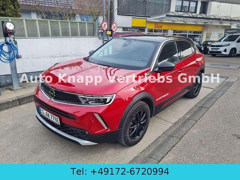 Power rot Gebraucht 2021 Opel Mokka-e Ultimate SUV | 16.890 € (Fairer Preis) - Bild 1/4