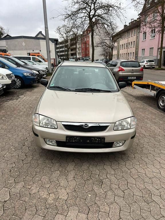 Gebraucht Mazda 323 88 PS (64 kW) 1999 Grau Limousine