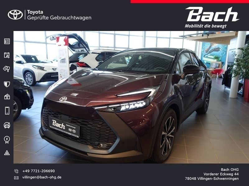 Dunkel amethyst/schwarz Gebraucht 2024 Toyota C-HR Team SUV | 36.090 € - Bild 1/4