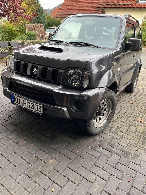 Grau Gebraucht 2018 Suzuki Jimny Comfort SUV | 17.990 € (Fairer Preis) - Bild 1/4