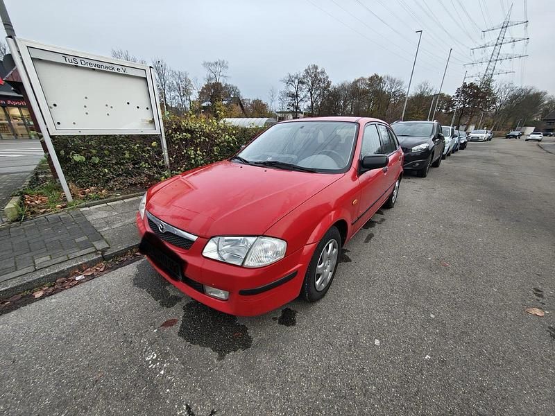 Rot Gebraucht 1999 Mazda 323F Kleinwagen | 2.000 € - Bild 1/4