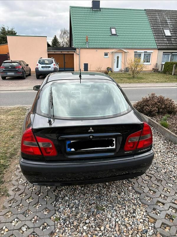 Gebraucht Mitsubishi Carisma Edition 103 PS (75 kW) 2003 Schwarz Limousine