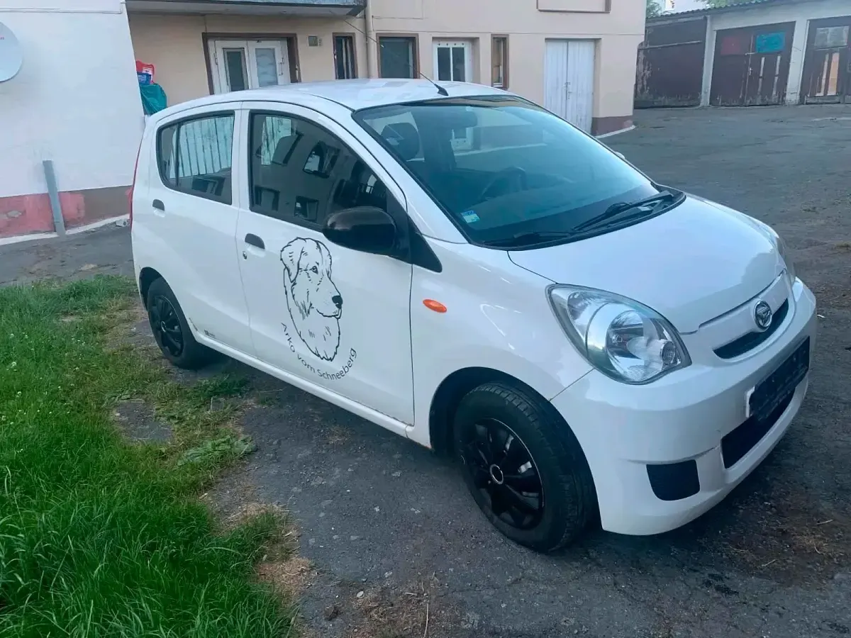 Gebraucht Daihatsu Cuore 70 PS (51 kW) 2010 Weiß Kleinwagen