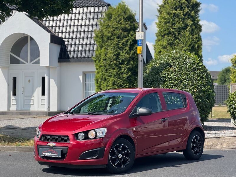 Rot Gebraucht 2013 Chevrolet Aveo LS Kleinwagen | 3.790 € (Fairer Preis) - Bild 1/4