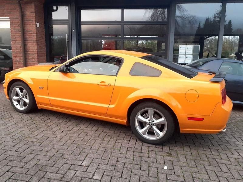 Gebraucht Ford Mustang GT 305 PS (224 kW) 2008 Orange