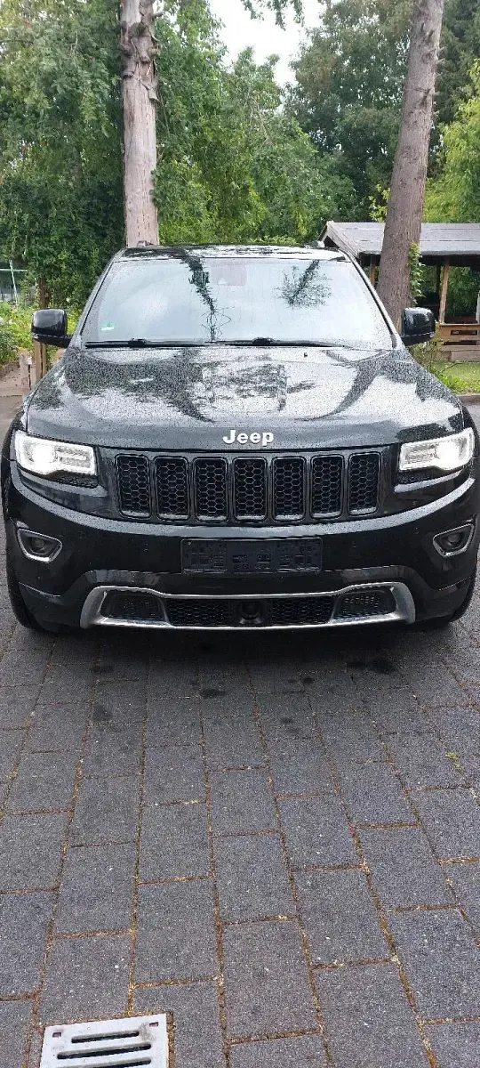 Gebraucht Jeep Grand Cherokee Overland 250 PS (183 kW) 2014 Schwarz SUV