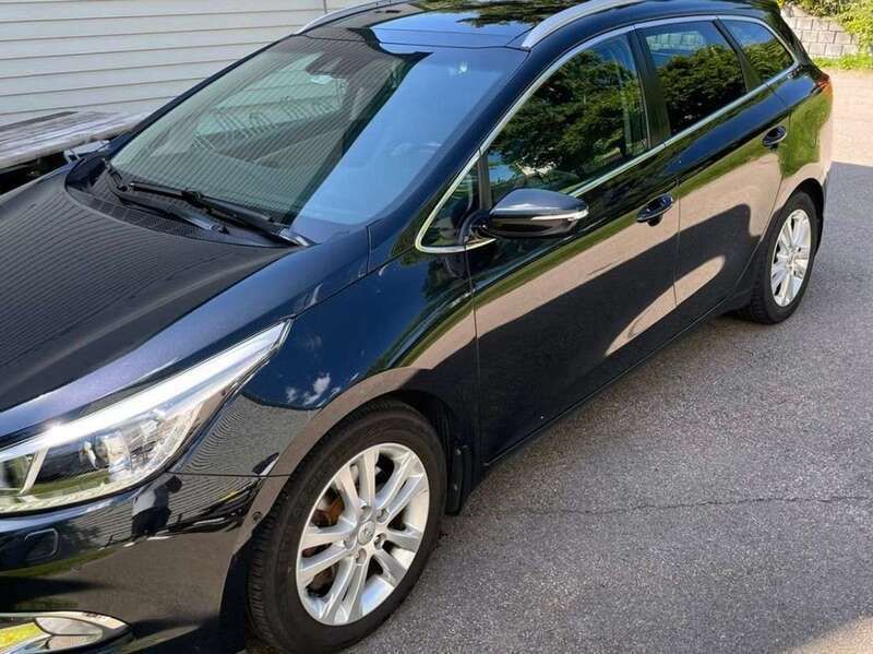 Grau Gebraucht 2014 Kia Ceed Sportswagon Platinum Edition Kombi | 7.790 € (Superpreis) - Bild 1/4