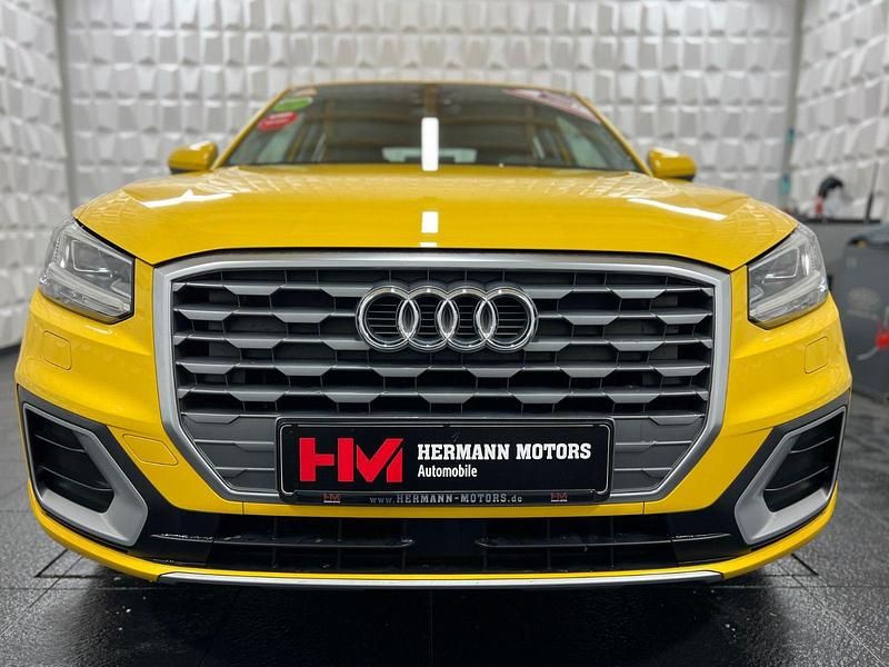 Używany Audi Q2 Sport 116 KM (85 kW) 2017 Żółty SUV