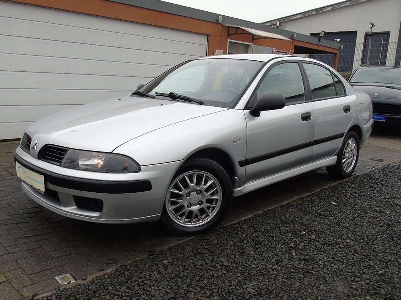 Grau Gebraucht 2004 Mitsubishi Carisma Comfort Edition Limousine | 2.400 € (Teuer) - Bild 1/4