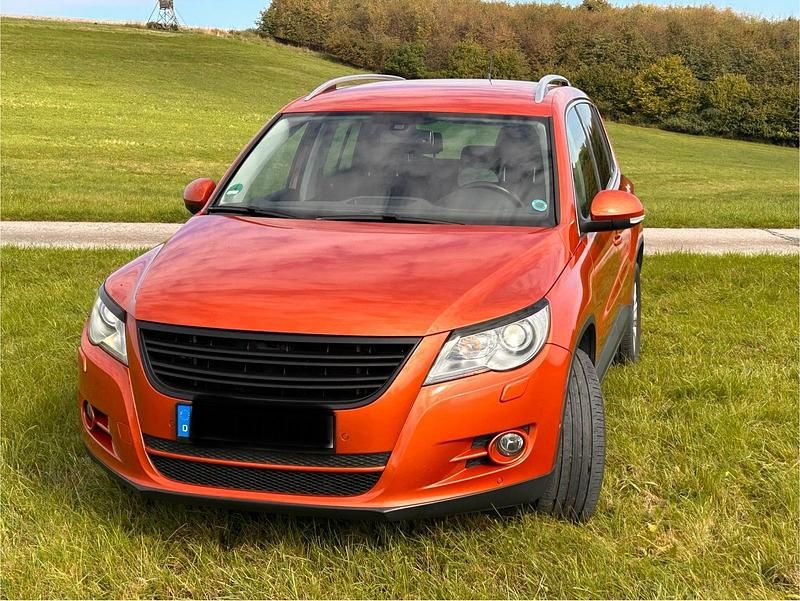 Orange Gebraucht 2010 VW Tiguan Team SUV | 8.700 € (Etwas zu teuer) - Bild 1/4