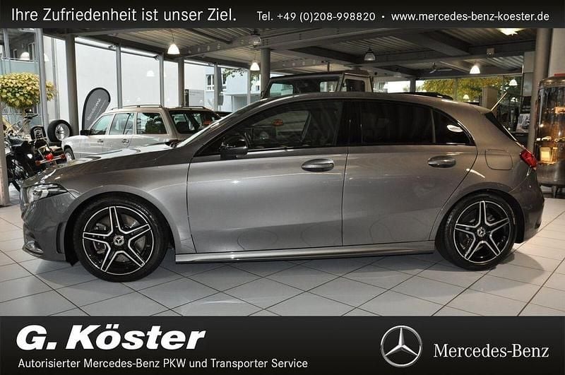 Mountaingrau met. Gebraucht 2019 Mercedes A250 AMG line Limousine | 23.800 € (Superpreis) - Bild 1/4