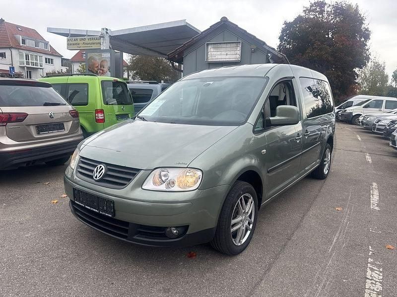 Grün Gebraucht 2010 VW Caddy Maxi Life Team Van / Kleinbus | 6.990 € (Fairer Preis) - Bild 1/4