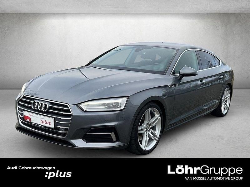 Monsungrau metallic Gebraucht 2019 Audi A5 Sportback Ambiente Kleinwagen | 27.850 € (Guter Preis) - Bild 1/4