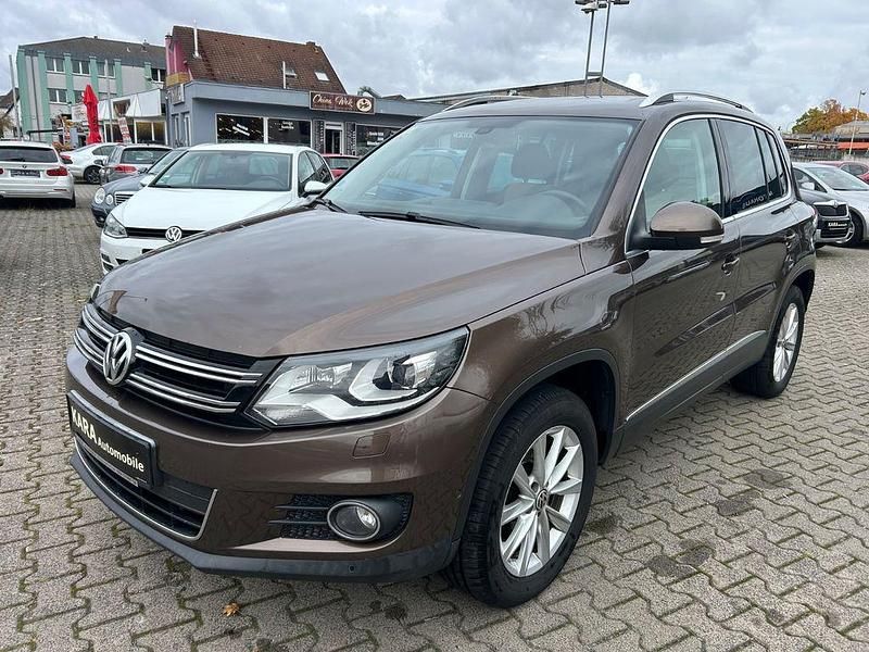 Braun Gebraucht 2011 VW Tiguan Sportline SUV | 8.950 € - Bild 1/4