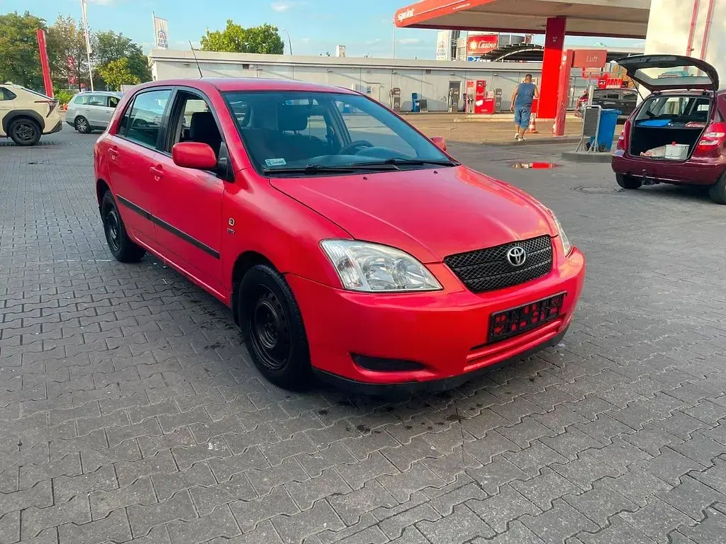 Gebraucht Toyota Corolla 97 PS (71 kW) 2004 Rot Kombi