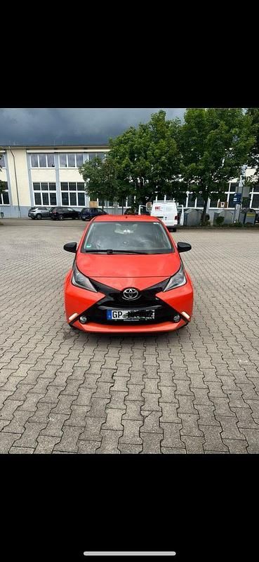 Gebraucht Toyota Aygo 69 PS (50 kW) 2014 Orange Kleinwagen