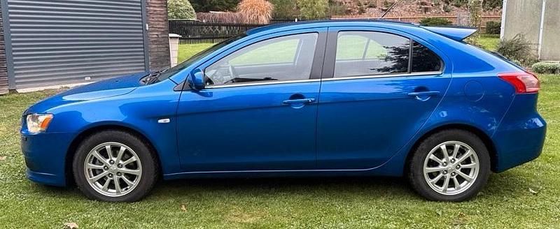 Second-hand Mitsubishi Lancer 117 CP (86 kW) 2011 Albastru Berlinǎ