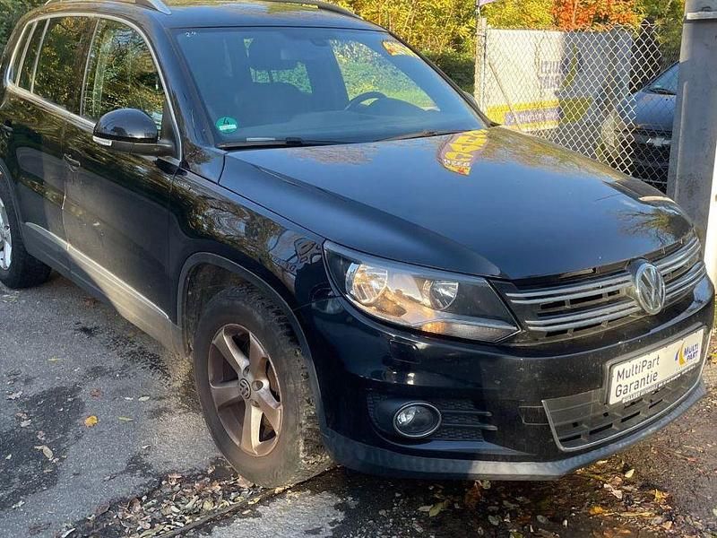 Schwarz Gebraucht 2015 VW Tiguan LOUNGE SUV | 10.450 € (Fairer Preis) - Bild 1/3