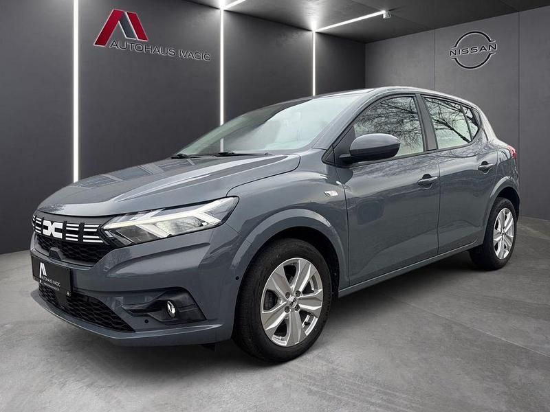 Grau Gebraucht 2023 Dacia Sandero Expression Limousine | 13.990 € (Guter Preis) - Bild 1/4