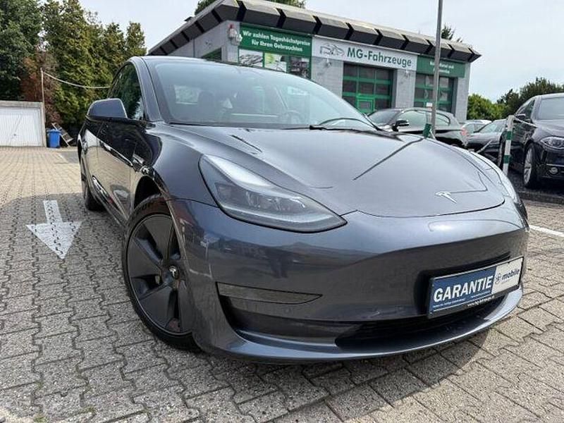 Grau Gebraucht 2021 Tesla Model 3 Limousine | 27.998 € (Fairer Preis) - Bild 1/4