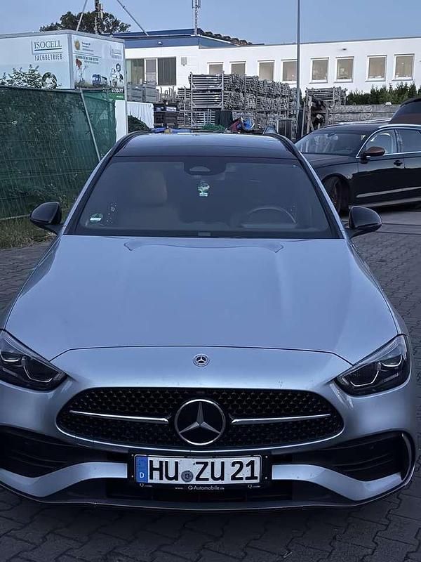 Silber Gebraucht 2023 Mercedes C300e AMG line Kombi | 41.700 € (Fairer Preis) - Bild 1/4