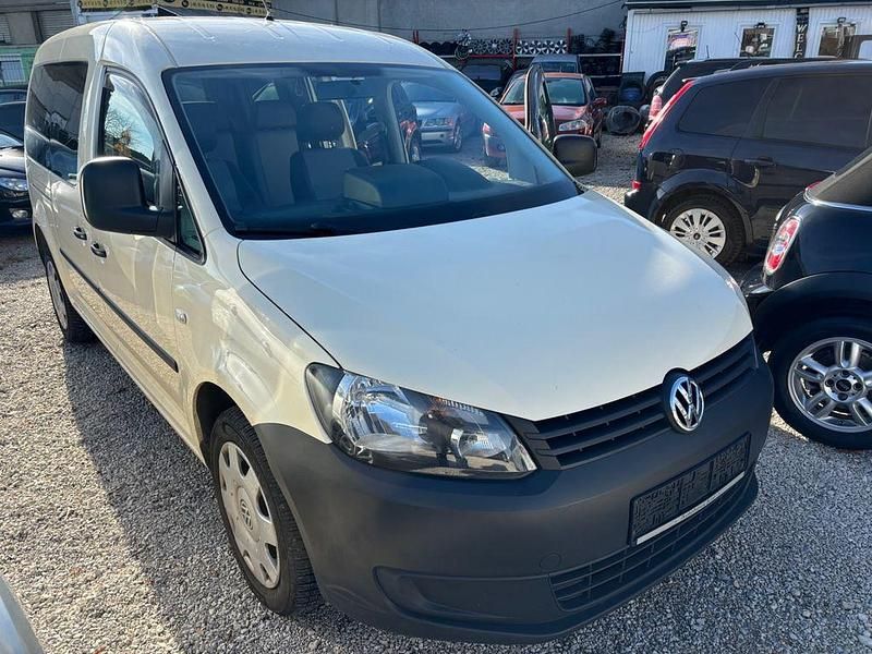 Gelb Gebraucht 2014 VW Caddy Maxi Trendline Van / Kleinbus | 5.700 € (Superpreis) - Bild 1/4